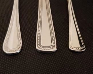 https://ctbids.com/#!/description/share/422401 Sysco Spoons, Oneida Forks & Delco Knives: 6 Spoons, 6 Forks and 6 Table Knives. All feature a beaded detailed edge.