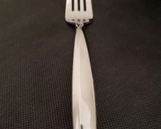 https://ctbids.com/#!/description/share/422464 6 Count: "Glissade" Forks By Oneida. "This premium pattern feels flawless and seamless in your hand thanks to its graceful curves, mirror finish, and swept surfaces. The name Glissade speaks to the fluid motion created by its shape. A dramatic arch in each piece makes a sculptural statement on your tabletop. 18/0 Stainless Steel. Heavy gauge. Quality finish." 