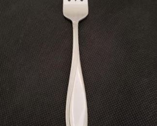 12 Count: "Scroll" 18/8 Forks By Oneida. Graceful. Transitional. Original. Sweeping asymmetrical lines give Scroll 18/8 stainless a fashionable, fresh look. This flatware exudes the kind of quality and craftsmanship that you expect. 18/8 Stainless Steel. Superb finish and pattern detail. Long lasting durability.  https://ctbids.com/#!/description/share/422454