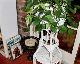 Wicker plant stand with plant
