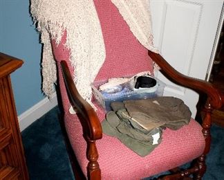 Pink upholstered rocking chair