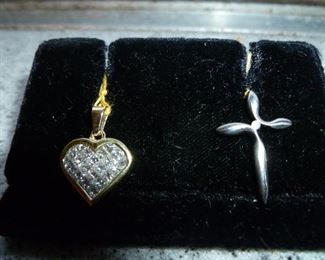 18 K diamond heart.  Platinum small cross w diamond