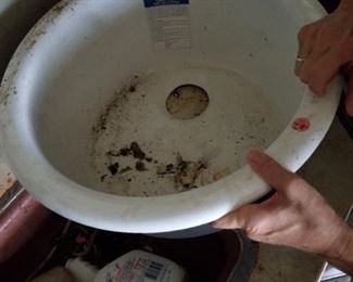 Cast iron with porcelain/ enamel  brand new Kohler round sink.  Heavy