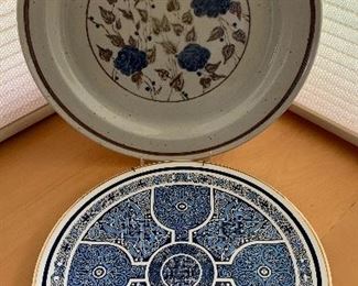 #17.          $10
2pc. Plate Lot
 Floral-12”
Lindisfarne Gospels-Anne Bowyer(Nexus Design)-11”