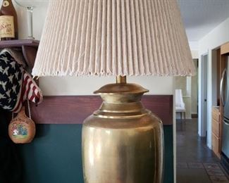 Needs a new shade but this is a fabulous brass base lamp. 