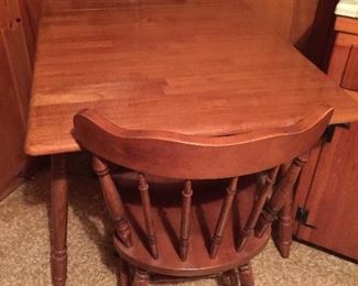 Wonderful small vintage drop leaf table with two chairs