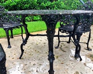 Detail: Robert Wood Foundry, Victorian-era cast iron outdoor table chairs