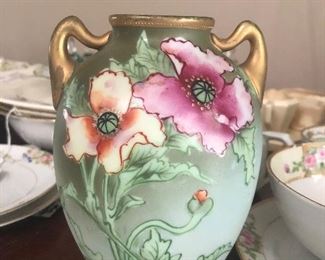 Nippon hand painted vase with two handles.  Only 6” high.  Stamped on the bottom, Nippon.