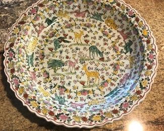 Decorative Plate, Large rimmed pottery platter or bowl.  Unusual hand painted flora, fauna and fruit.  No maker or signature on the back.