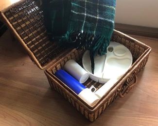 Super nice picnic basket.  Blanket, 2 plates, 2 cups and thermos.  Get your Orvis fishing rod and go on a picnic!