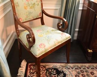 ITEM 2: Kindel Neoclassical Upholstered Dining Chairs (10)  $1500:
Upholstered in luscious pale blue fabric with yellow, pink and blue flowers, and double piping. Woodwork and upholstery are in excellent condition. Eight side chairs, two armchairs. 