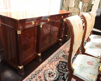 ITEM 3: Kindel Neoclassical Sideboard  $425:
Matches dining table, breakfront and chairs. Center drawer locks and has silver storage. This piece has sun fading on the top back edge nearest the window. Otherwise in very good condition. 76" long x 21" deep, x 34.5" tall