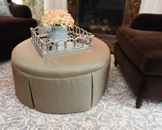 ITEM 14: Kravet Furniture Circular Ottoman  $250:
Upholstered and skirted in a gorgeous silvery-gray and blue textured fabric, this ottoman has tailored pleats, piping, and is finished with a single beaded button in the center. Excellent condition. 36" round, 16" tall