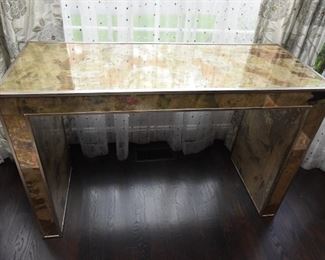 ITEM 16: Mirrored Sofa Table  $325
Mirror finished with swaths of gold, copper, bronze tones. 50.5" wide, 20" deep, 32.5" tall