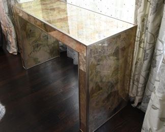 ITEM 16: Mirrored Sofa Table  $325
Mirror finished with swaths of gold, copper, bronze tones. 50.5" wide, 20" deep, 32.5" tall