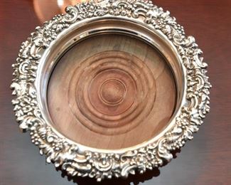 ITEM 30: Pair Wood Bottom Wine Coasters  $12