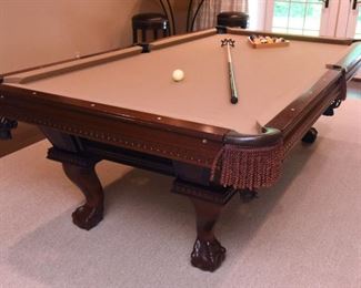 ITEM 41: Eight Foot Leather Pocket Pool Table  $450
Unmarked. Three-piece slate top. Currently covered in beige felt. Balls and cues included. Professional mover required. 