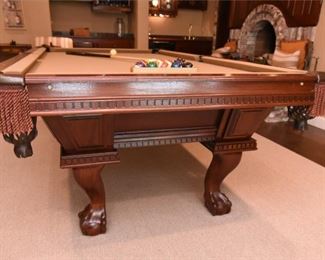ITEM 41: Eight Foot Leather Pocket Pool Table  $450
Unmarked. Three-piece slate top. Currently covered in beige felt. Balls and cues included. Professional mover required. 