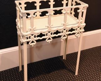 ITEM 57: Painted Cast Iron Planter Stand  $65
18" long, 9.5" wide, 24" tall