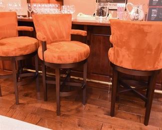 ITEM 63: Three Orange Faux Suede Swivel Bar Stools $550
Good condition. Some dings to dark wood, can be fixed with a wood stain pen.