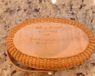 ITEM 77: Small Bill & Janet Sayles Nantucket Basket  $325
Oval basket is 6" long, 4" wide, signed on the bottom, made in 1998. Excellent condition