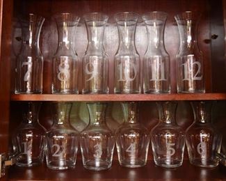 ITEM 82: Set of 12 Numbered Wine Carafes  $75
An absolute must for wine tasting. Numbers are etched into the glass.