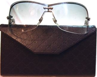 ITEM 89: Gucci Rimless Shield Sunglasses $65