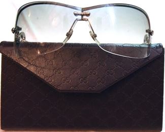 ITEM 89: Gucci Rimless Shield Sunglasses  $65