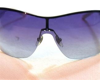 ITEM 94: Gucci Shield Sunglasses  $30