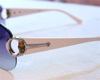 ITEM 94: Gucci Shield Sunglasses  $30