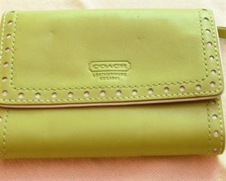 ITEM 95: Coach Lime Green Tri-Fold Wallet  $16