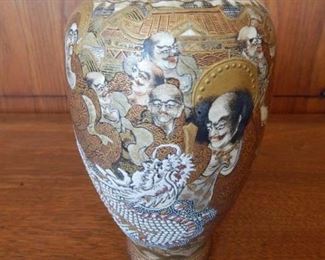 #19 - $15 - Asian Vase with faces and dragon. Has crazing and a small chip on the lid (see pictures)
