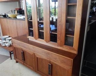 Welcome to the estate sale -- this item Mid Century John Keal for Brown Saltman is #34 and is $900 and yes it is (2) pieces and can be separated and the bottom would make a great credenza that you could put a flat screen above, fabulous