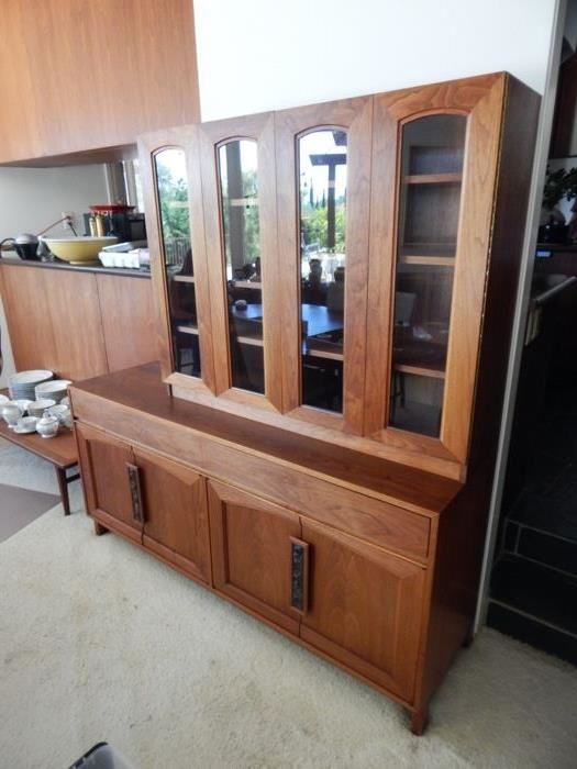Welcome to the estate sale -- this item Mid Century John Keal for Brown Saltman is #34 and is $900 and yes it is (2) pieces and can be separated and the bottom would make a great credenza that you could put a flat screen above, fabulous