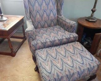 #75 - $10 - Chair with Ottoman - Measures 43" Tall, 31" Wide, and 29" Deep