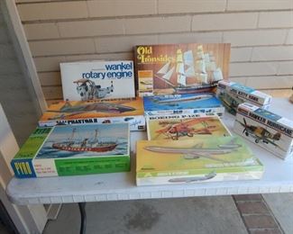 #84 - $100 - Collection of plastic models (9) in total - BOEING P-12 E (COMPLETE IN BAGS, NEVER USED), PYRO NANTUCKET SHIP (COMPLETE IN BAGS, NEVER USED), USAF PHANTOM (COMPLETE IN BAGS, NEVER USED) HAWKER HURRICANE (COMPLETE IN BAGS, NEVER USED, DC 10 LUXURY LINER by AURORA (Sealed never opened) The rest are opened and pieces missing