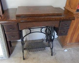 #95 -$125 - Quarter Sawn Oak Sewing Machine - unable to open but the machine looks in good shape - Sold as-is . Measures 30" Tall, 34" Wide, and 18 1/2" Deep