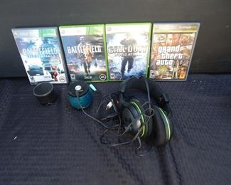 #106 - $40 - (4) X-Box Games and a pair of X32 Headphones and two small speakers