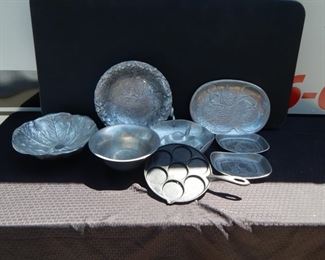 #111 - $20 - (7) Pewter pieces (1) Cast Iron