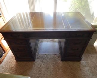 #113 - $25 - Walnut Desk with Leather Top made by Sligh-Lowry, includes chair. 54" wide, 30" Deep, 