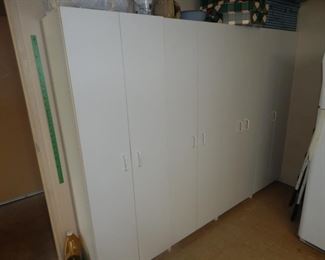 #150 - $5 each - White storage cabinets there are (8) available buy 1-8 but each one is $20 each - 70 1/2" tall 24" Wide and 17" deep