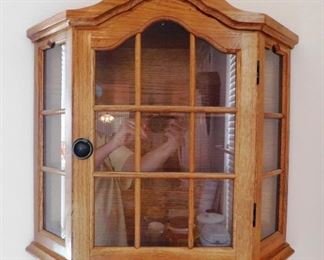 $50.  OAK WALL DISPLAY CABINET.  Email us or call 512-954-3050 to buy it now or make an offer.