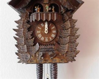 $350. GERMAN CHALET STYLE CUCKOO CLOCK. Missing one of the pine cone weights.  Very good outward condition but unsure if it works due to the missing weight.  Email us or call 512-954-3050 to buy it now or make an offer.