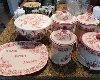 $100.  HOME SWEET HOME RED AND WHITE CERAMIC SERVING DISHES. DISHWASHER SAFE.  BUY IT BY THE PIECE OR THE WHOLE SET ($100)..  CAKE PLATE-$35.  PLATTER - $15.  CANNISTER SET - $45.  LIDDED COOKING POT W/HANDLE - $30.   Email us or call 512-954-3050 to buy it now or make an offer.