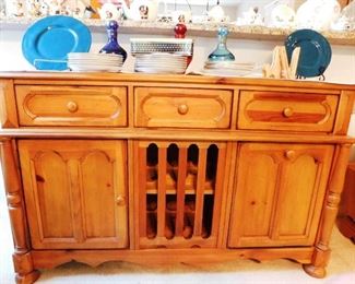 $500.  OAK HUTCH WINE RACK WITH STORAGE CABINETS.  VERY NICE PIECE!  Email us or call 512-954-3050 to buy it now or make an offer.