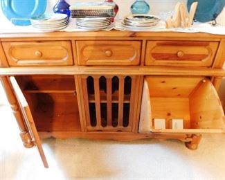 ONE OF THE STORAGE AREAS IS A LARGE PULL DOWN BIN!