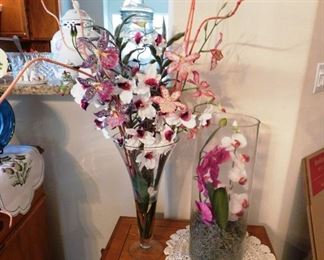$25 EACH.  2 ORCHID FLOWER ARRANGEMENTS IN GLASS VASES.   Email us or call 512-954-3050 to buy it now or make an offer.