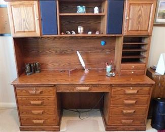 $500.  EXECUTIVE SOLID OAK WOLD DESK WITH BUILT IN SPEAKER SYSTEM.  EXCELLENT CONDITION.  ITEMS THAT ARE ON THE DESK ARE NOT INCLUDED.  Email us or call 512-954-3050 to buy it now or make an offer.