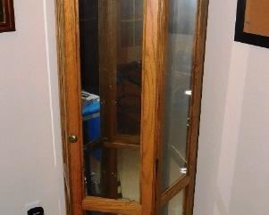 $300.  OAK DISPLAY CABINET WITH SHELVES.  Email us or call 512-954-3050 to buy it now or make an offer.