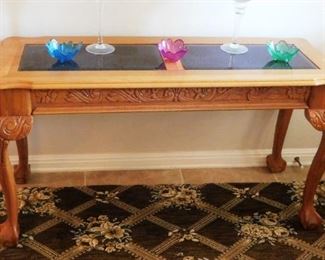 $200.  VERY NICE BALL AND CLAW GLASS TOP ENTRYWAY TABLE.  DOES NOT INCLUDE THE ITEMS ON TOP OF THE TABLE.  Email us or call 512-954-3050 to buy it now or make an offer.